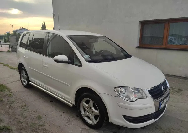 wielkopolskie Volkswagen Touran cena 23500 przebieg: 192364, rok produkcji 2010 z Płońsk